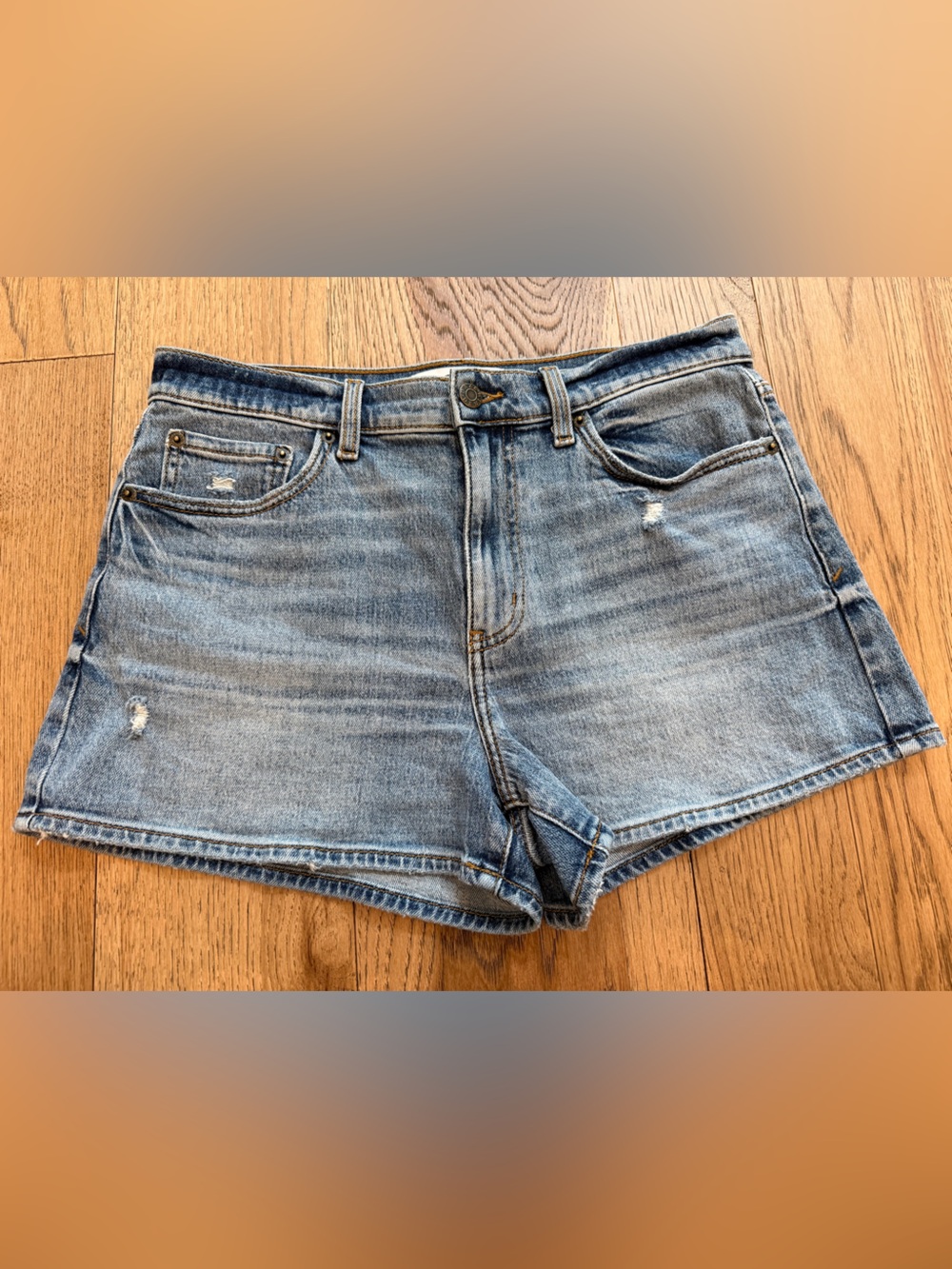 Women’s Mid-Rise Distressed Denim Jean Shorts - Light Blue